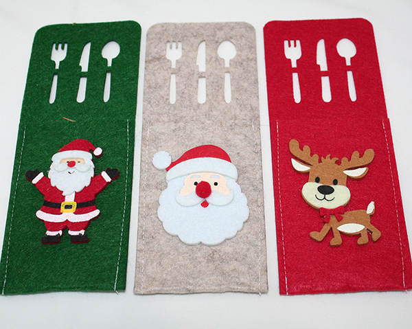 Cutlery bag 21x8x0.5cm decorated with Santa or elk, assorted