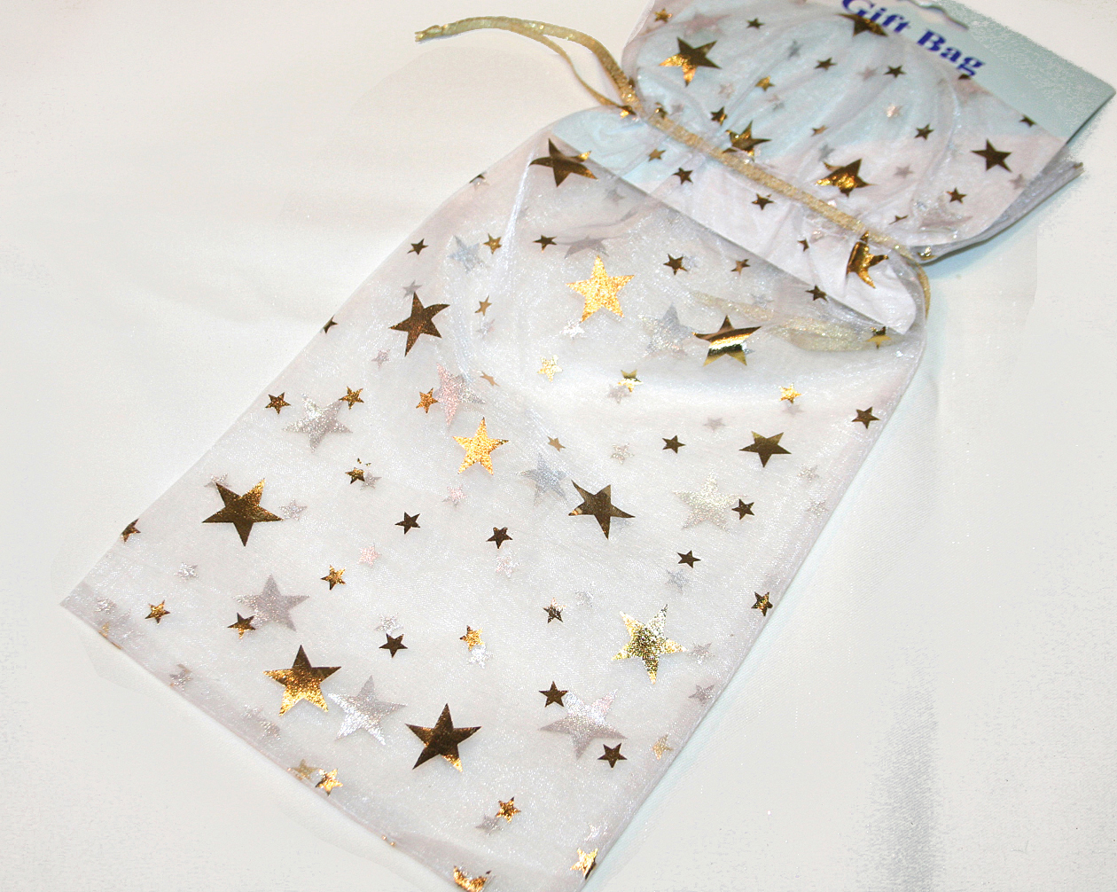 Organza bag XL white with gold stars 31x16,5cm