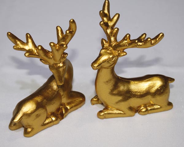 Sehr edler Hirsch aus goldenem Kunstharz 9x7,3x5cm